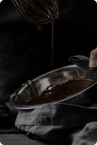 Whisking melted chocolate in a bowl
