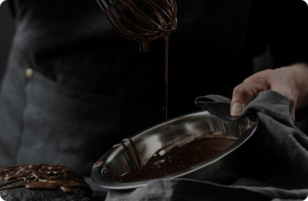 Whisking melted chocolate in a bowl
