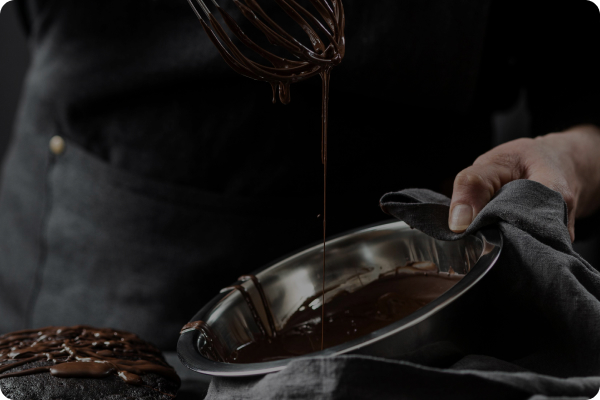 Whisking melted chocolate in a bowl